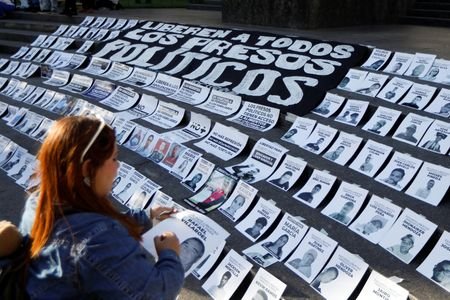 Relatives of political prisoners hold a protest called “Christmas Without