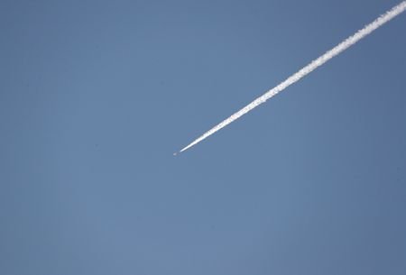 A Turkish fighter jet flies over the town of Hassa