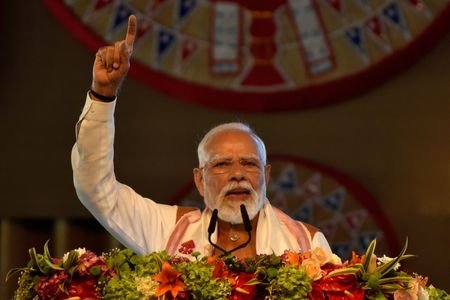India's PM Modi addresses his supporters after he inaugurated a