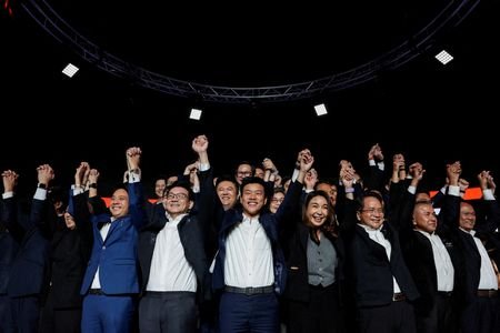 FILE PHOTO: People's Party PM candidate Natthaphong Ruengpanyawut attends a
