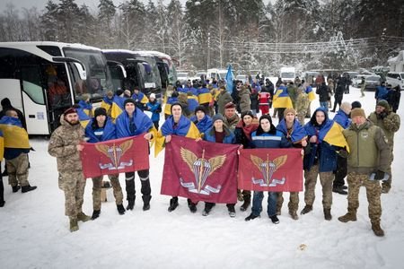 Ukrainian prisoners of war (POWs) pose for a picture after
