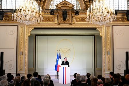 France's President Emmanuel Macron speaks during the 20th anniversary of