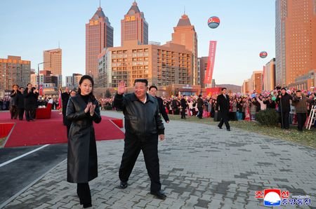 North Korean leader Kim Jong Un attends housing complex completion