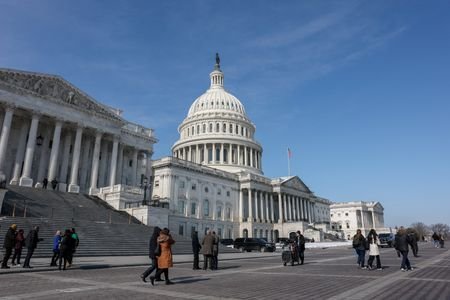 People walk near the U.S. Capitol building in Washington