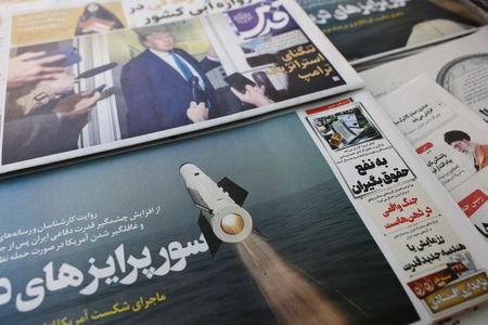An Iranian newspaper with a cover photo of an Iranian