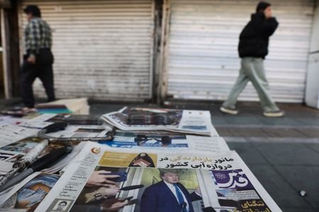 An Iranian newspaper with a cover photo of U.S. President