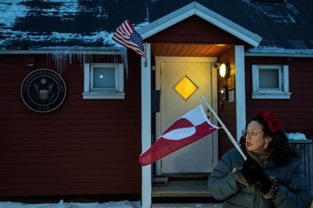 People protest in front of the U.S. consulate in Nuuk