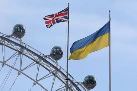 Ukraine flag and British Union flag fly from British government