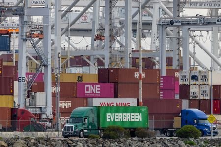 Shipping containers at the port of Oakland , California