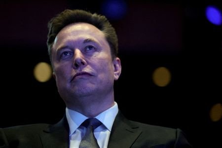 FILE PHOTO: Elon Musk becomes first person worth $700 billion