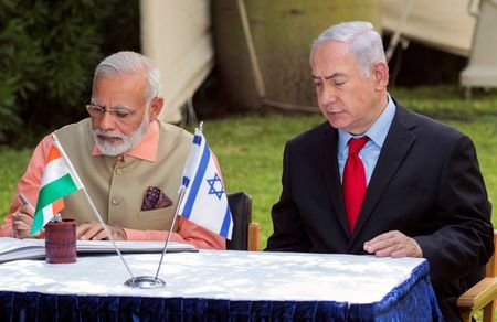 FILE PHOTO: Indian Prime Minister Narendra Modi and Israeli Prime