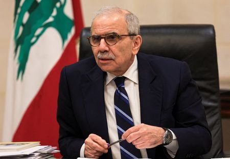 Lebanese Prime Minister Nawaf Salam speaks to journalists at the
