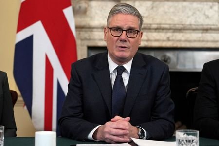 Britain's Prime Minister Keir Starmer delivers remarks at the top