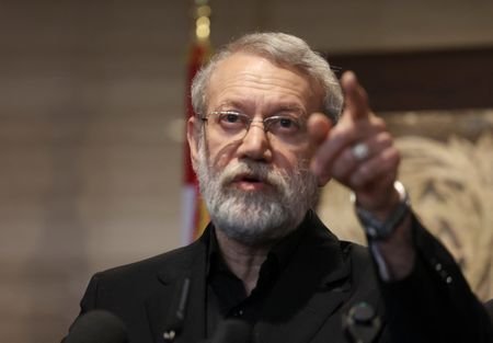 Iran's Supreme National Security Council Secretary Ali Larijani speaks after