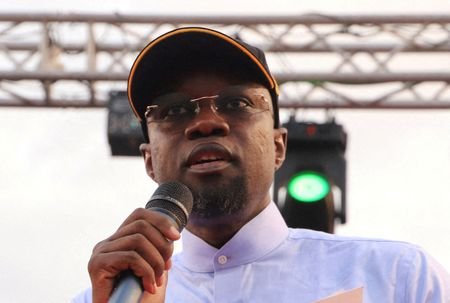 FILE PHOTO: Senegal's Prime Minister Ousmane Sonko holds a rally