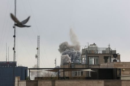 Smoke rises following an explosion, after Israel and the U.S.