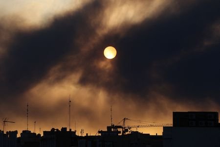 Smoke rises following an explosion in Tehran
