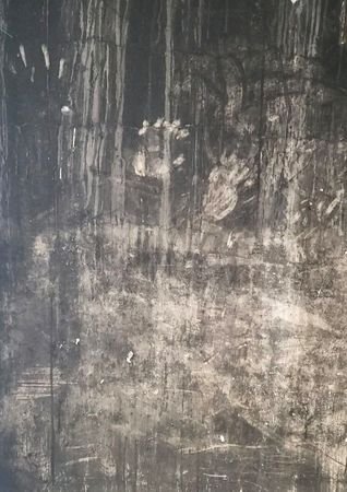 FILE PHOTO: Handprints on a blackened wall at Grenfell Tower,