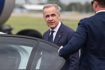 Canadian Prime Minister Mark Carney and his wife Diana Fox