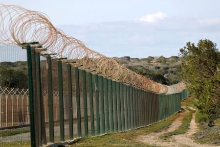 A fence at the entrance of RAF Akrotiri, a British