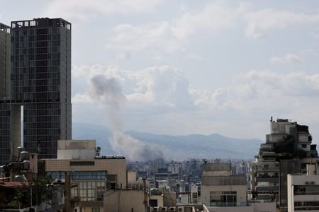 Smoke rises after an Israeli strike on Beirut's southern suburbs