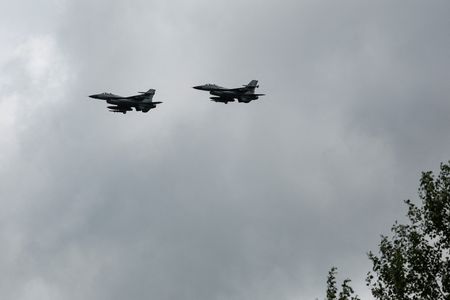 Ukrainian F-16 fighting aircrafts are seen in the air during