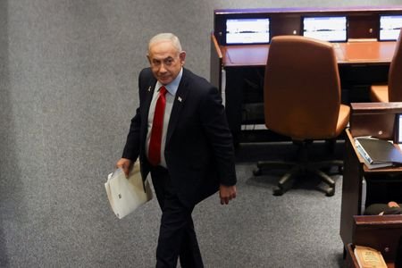 Israeli Prime Minister Benjamin Netanyahu attends a session at the