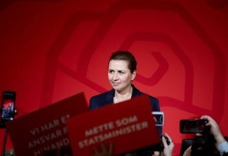 Denmark’s Frederiksen bruised in election, coalition talks loom
