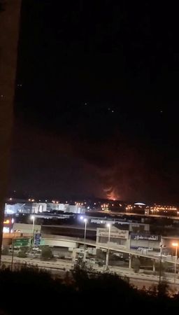 Smoke and fire rise in the direction of the fuel