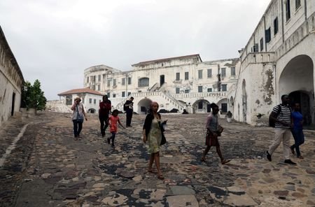 FILE PHOTO: Tourists are seen at the Cape Coast Castle