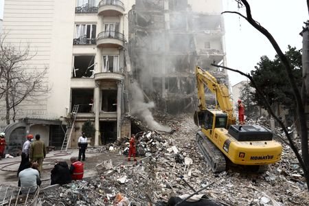 A view of a residential building damaged by a strike,