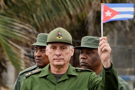 FILE PHOTO: Cubans march outside U.S. embassy for soldiers killed