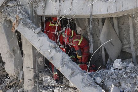Aftermath of a strike on a residential building in Tehran