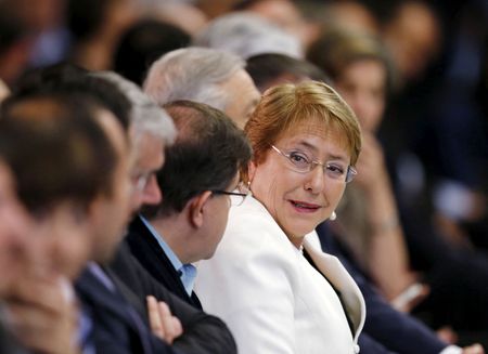 FILE PHOTO: Chile's President Michelle Bachelet meets with Chilean residents