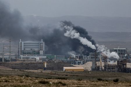 Smoke rises following an Iranian missile strike, in Southern Israel