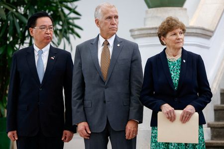 Taiwan'S NSC Secretary-General Wu, U.S. Senators Tillis and Shaheen attend
