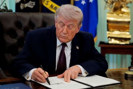 U.S. President Trump signs an executive order in the Oval