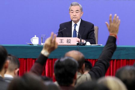 FILE PHOTO: Chinese Foreign Minister Wang Yi attends a press