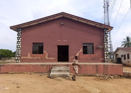 FILE PHOTO: A person walks outside the Christ Apostolic Church