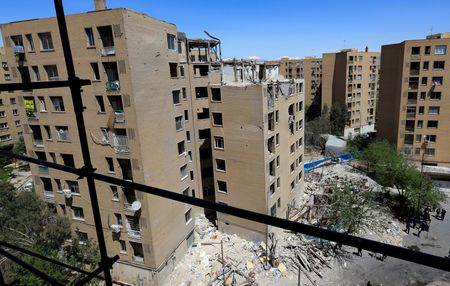 A residential building damaged by a strike on March 4,
