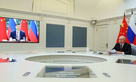Russia's President Putin holds talks via video link with China's