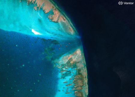 Exclusive-China moves to block entrance to disputed South China Sea shoal, images show
