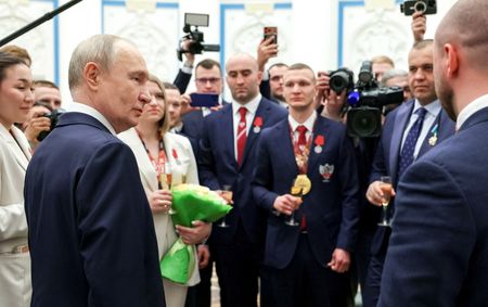 Olympics-Putin criticises previous IOC leadership as ‘shameful, cowardly’