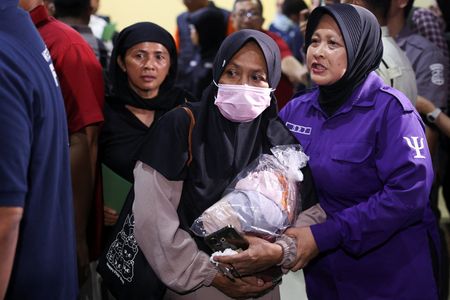 Indonesia commuter train crash toll rises to 15 as rescuers complete evacuation