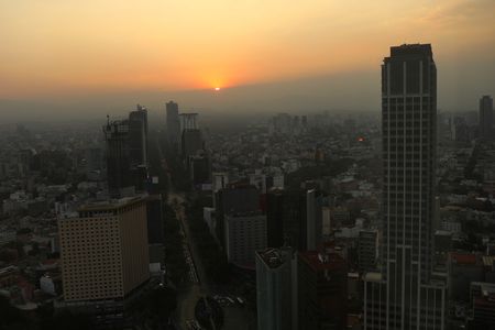 A view of the skyline during a sunset along Reforma