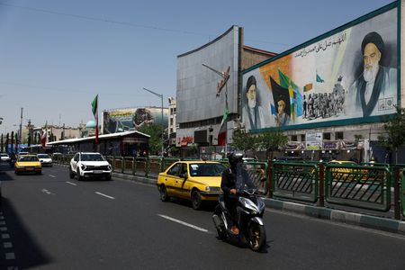 Mural depicting late Iranian leaders in Tehran