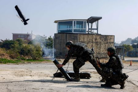FILE PHOTO: Soldiers operate a Taiwan-made attack drone during an