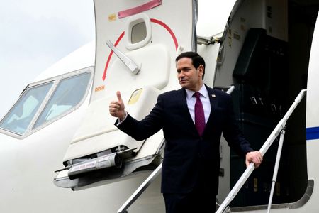 U.S. Secretary of State Marco Rubio boards his plane at