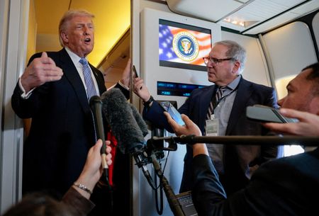FILE PHOTO: U.S. President Donald Trump speaks to members of