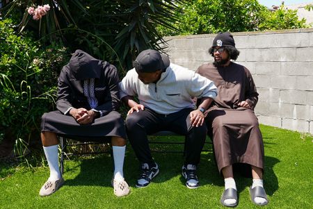 Sons of security guard Amin Abdullah, who was killed in